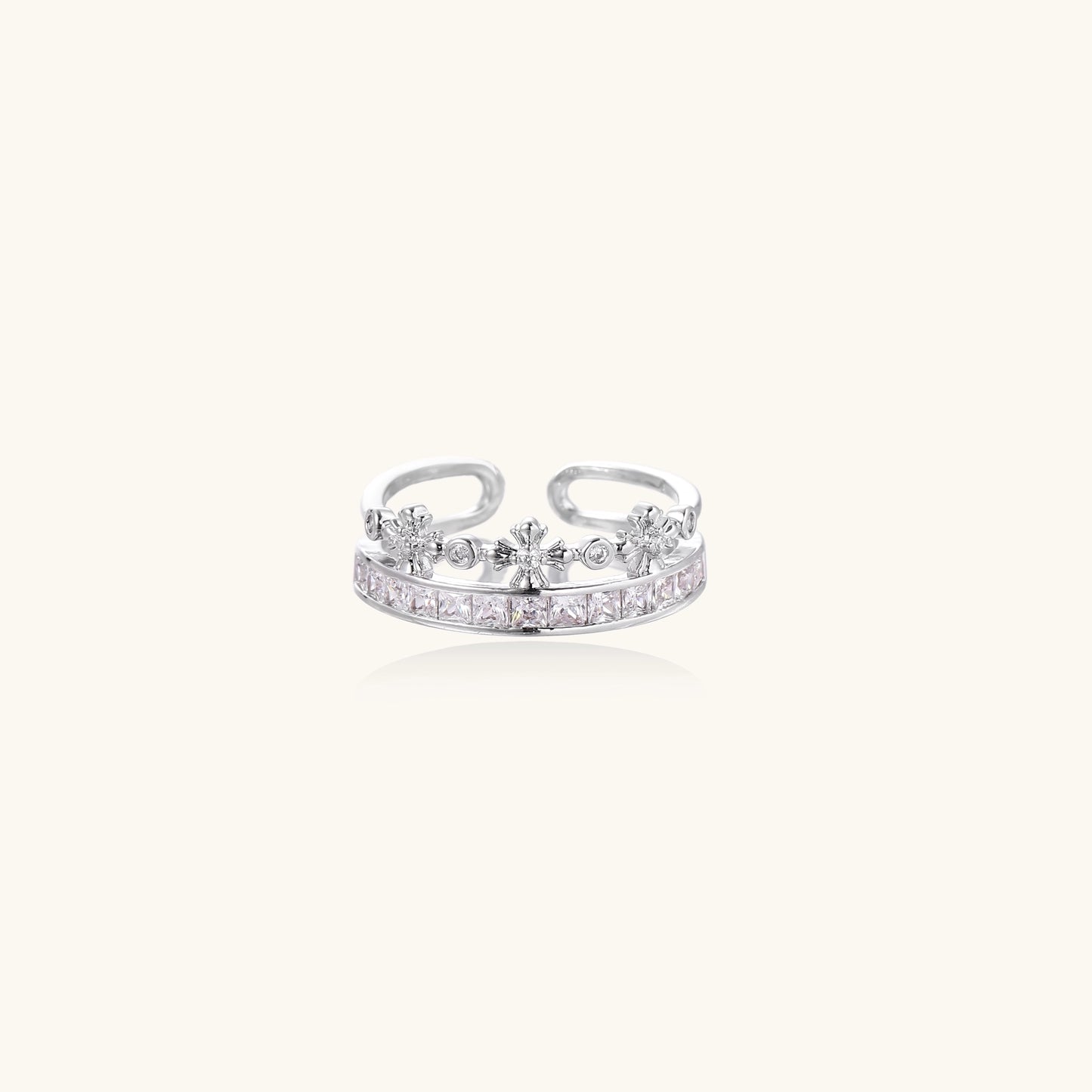 Adjustable gold-plated crown ring with zirconia crystals in ornate tiara design on white background.