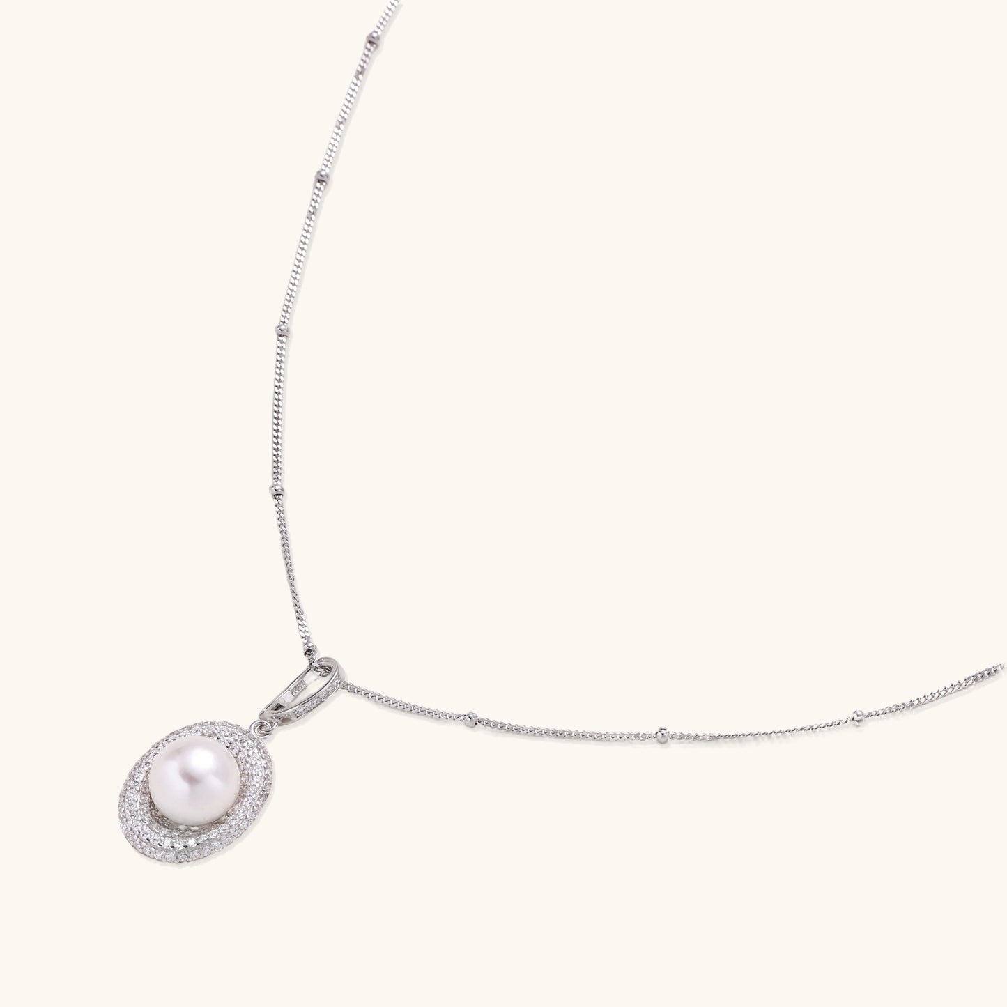 Sterling silver necklace with freshwater pearl in sparkling crystal halo pendant on delicate beaded chain
