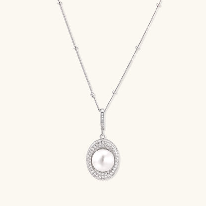 Sterling silver necklace with freshwater pearl in sparkling crystal halo pendant on delicate beaded chain