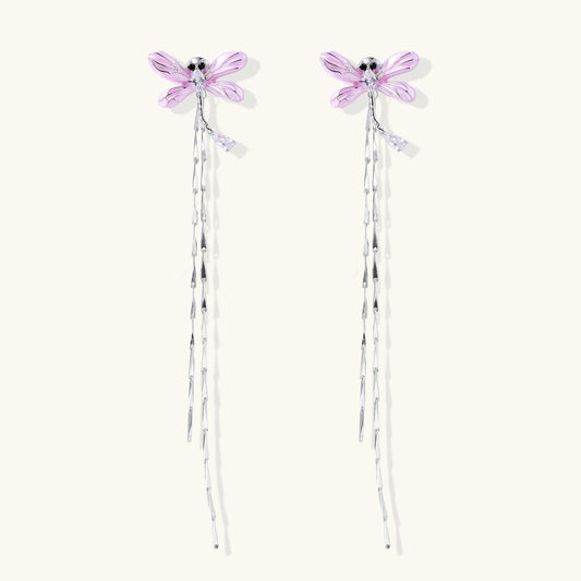 Long dangle earrings with purple dragonfly charms and crystal chains on white background, gold-plated finish.