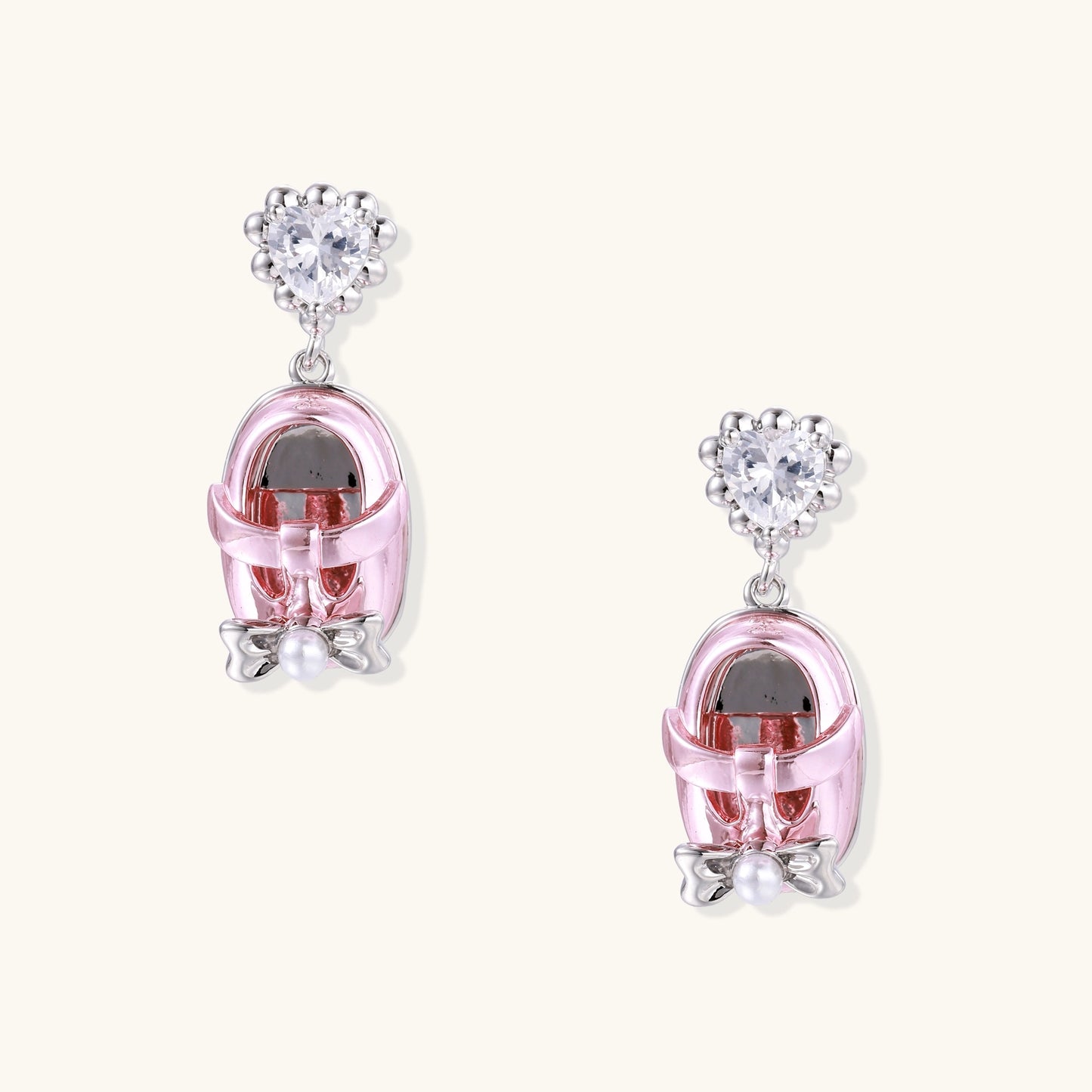 18K gold plated drop earrings with heart-shaped zirconia studs and translucent mini handbag pendants with pearl accents