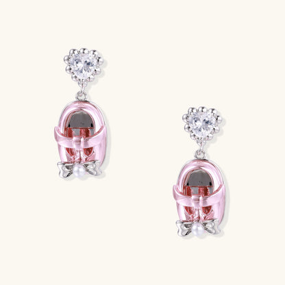 18K gold plated drop earrings with heart-shaped zirconia studs and translucent mini handbag pendants with pearl accents