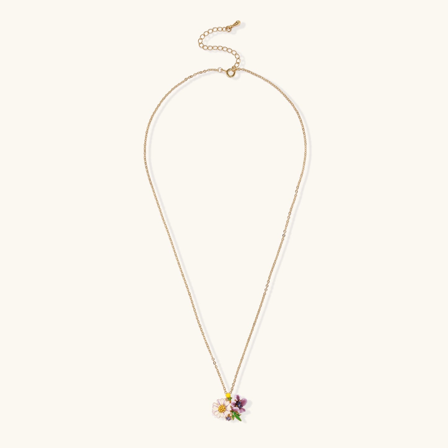 Delicate 18K gold plated necklace featuring colorful enamel flowers in pink and white with green leaves on chain